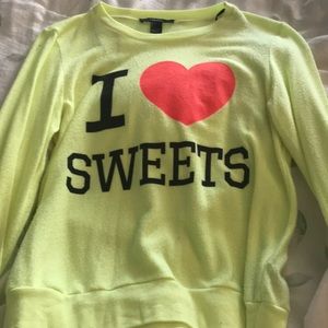 yellow sweatshirt with writing